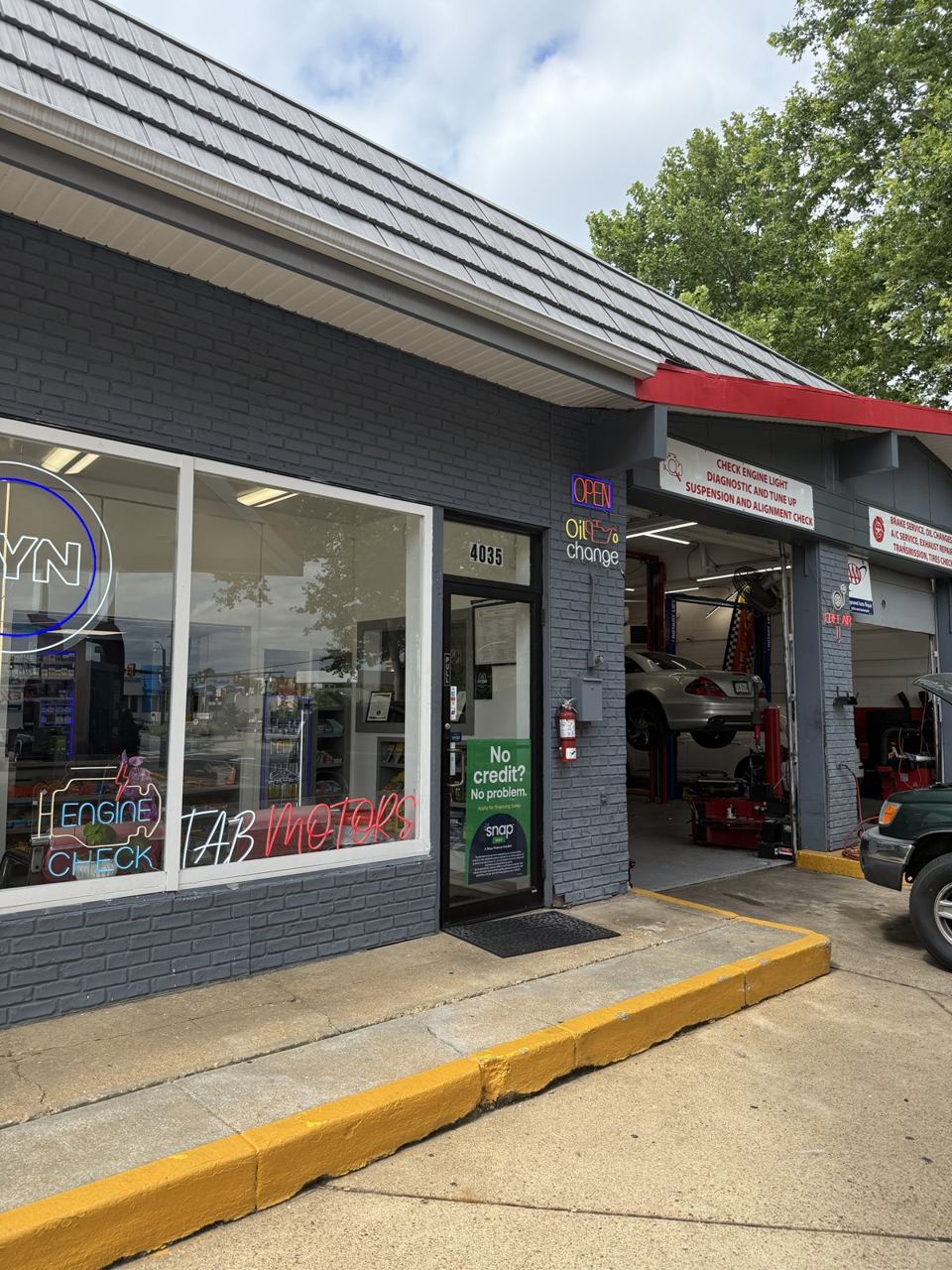 Tab Motors Auto Repair | Exxon storefront in Arlington, VA
